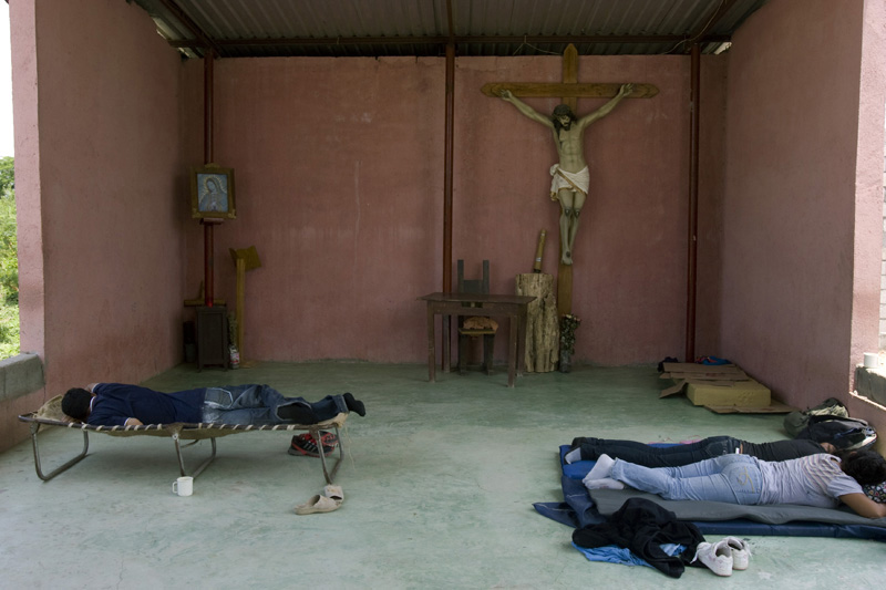 Illegal immigrants rest in a shelter in the city of Ixtepec, Mexico